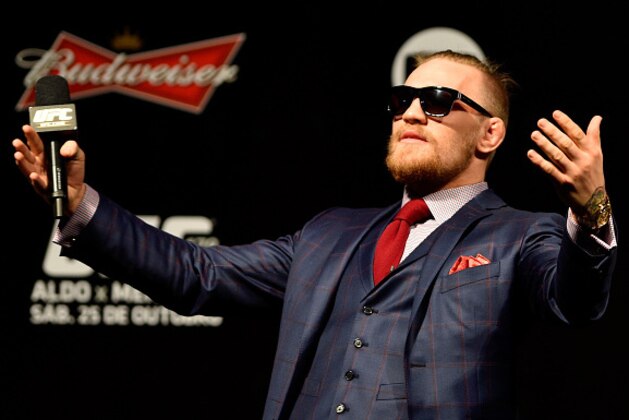 RIO DE JANEIRO, BRAZIL - OCTOBER 24: Conor McGregor of Ireland interacts with fans during a Q&A session before the UFC 179 weigh-in  at Maracanazinho on October 24, 2014 in Rio de Janeiro, Brazil.  (Photo by Buda Mendes/Getty Images)