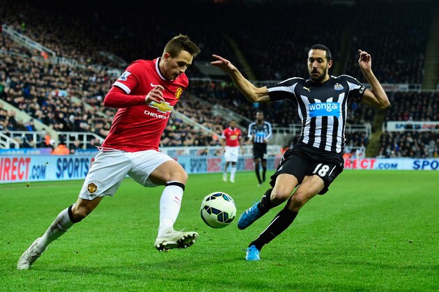 NEWCASTLE UPON TYNE, ENGLAND - MARCH 04:  Jonas Gutierrez (r) of Newcastle challenges Adnan Januzaj of Manchester United during the Barclays Premier League match between Newcastle United and Manchester United at St James' Park on March 4, 2015 in Newcastle upon Tyne, England.  (Photo by Stu Forster/Getty Images)
