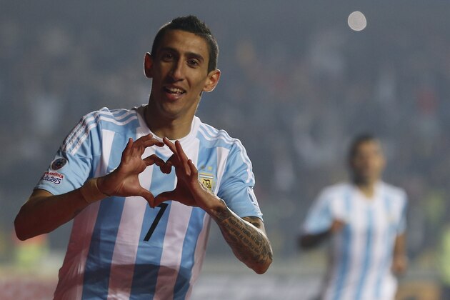 Argentina's Angel Di Maria celebrates after scoring his team;'s third goal during a Copa America semifinal soccer match against Paraguay at the Ester Roa Rebolledo Stadium in Concepcion, Chile, Tuesday, June 30, 2015. (AP Photo/Silvia Izquierdo)