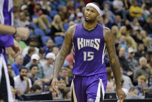 Sacramento Kings center DeMarcus Cousins (15) walks down court during the third quarter of an NBA basketball game against the Minnesota Timberwolves in Minneapolis, Saturday, Nov. 22, 2014. The Kings won 113-101. (AP Photo/Ann Heisenfelt)