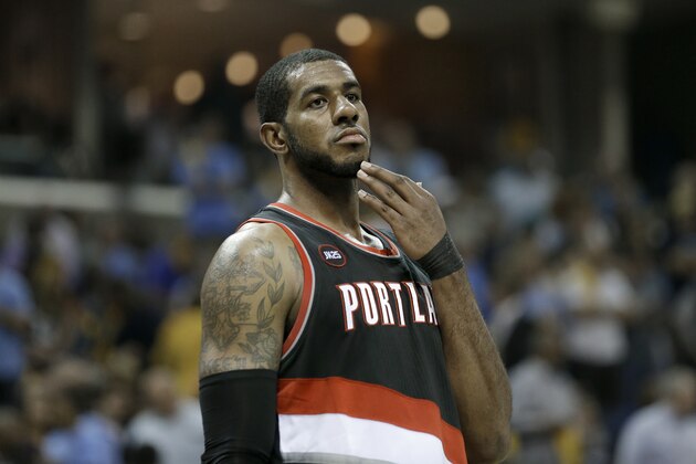 Portland Trail Blazers forward LaMarcus Aldridge waits for play to resume in the second half of Game 2 of an NBA basketball Western Conference playoff series against the Memphis Grizzlies Wednesday, April 22, 2015, in Memphis, Tenn. The Grizzlies won 97-82 and lead the series 2-0. (AP Photo/Mark Humphrey)