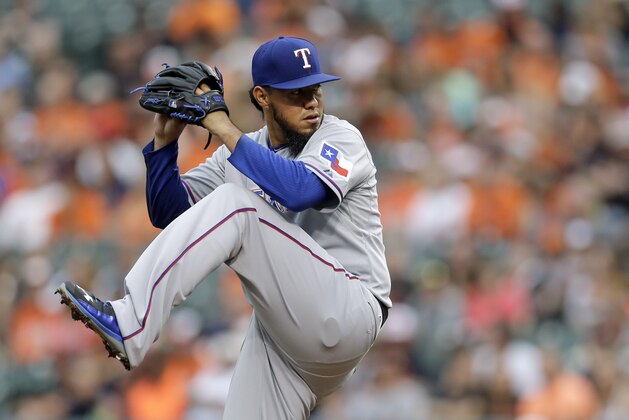 Texas Rangers starting pitcher Yovani Gallardo throws to the Baltimore Orioles during the first inning of a baseball game, Thursday, July 2, 2015, in Baltimore. (AP Photo/Patrick Semansky)