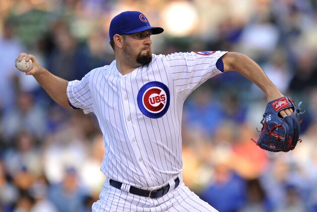 Chicago Cubs starter Jason Hammel delivers a pitch during the first inning of a baseball game against the Los Angeles Dodgers on Tuesday, June 23, 2015, in Chicago. (AP Photo/Paul Beaty)