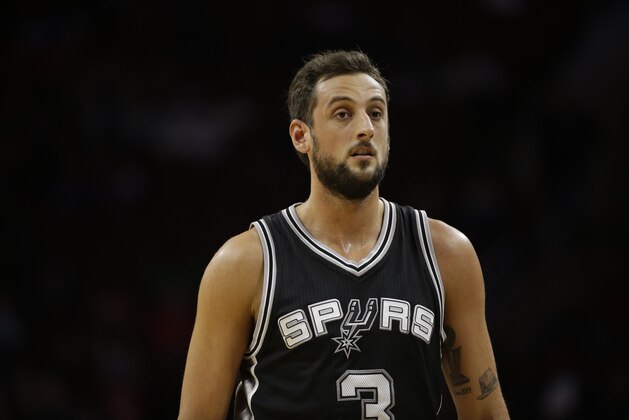 San Antonio Spurs' Marco Belinelli in action during an NBA basketball game against the Philadelphia 76ers, Monday, Dec. 1, 2014, in Philadelphia. (AP Photo/Matt Slocum)