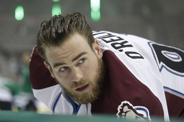 Colorado Avalanche center Ryan O'Reilly glances up during warm ups before an NHL hockey game Friday, Feb. 27, 2015, in Dallas. (AP Photo/LM Otero)