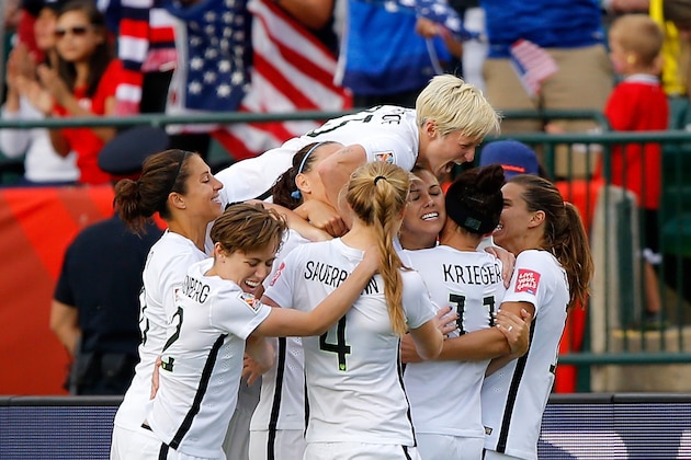 EDMONTON, AB - JUNE 22: Alex Morgan #13 of the United States celebrates with teammates after Morgan scores her first goal against goalkeeper Stefany Castano #1 of Colombia in the second half in the FIFA Women's World Cup 2015 Round of 16 match at Commonwealth Stadium on June 22, 2015 in Edmonton, Canada. (Photo by Kevin C. Cox/Getty Images) EDMONTON, AB - JUNE 22: Alex Morgan #13 of the United States celebrates with teammates after Morgan scores her first goal against goalkeeper Stefany Castano #1 of Colombia in the second half in the FIFA Women's World Cup 2015 Round of 16 match at Commonwealth Stadium on June 22, 2015 in Edmonton, Canada. (Photo by Kevin C. Cox/Getty Images)
