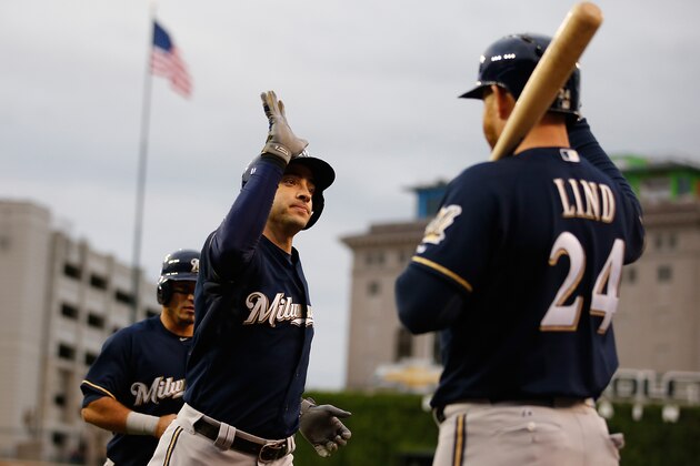DETROIT, MI - MAY 19:   Ryan Braun #8 of the Milwaukee Brewers celebrates his third inning home home run with Adam Lind #24 while playing the Detroit Tigers at Comerica Park on May 19, 2015 in Detroit, Michigan.  (Photo by Gregory Shamus/Getty Images)