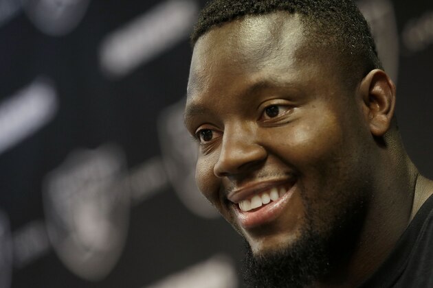 Oakland Raiders linebacker Curtis Lofton speaks to reporters after practice at an NFL football facility in Alameda, Calif., Tuesday, June 2, 2015. (AP Photo/Jeff Chiu)