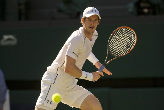Jun 30, 2015; London, United Kingdom; Andy Murray (GBR) in action during his match against Mikhail Kukushkin (KAZ)) on day two of The Championships Wimbledon at the AELTC. Mandatory Credit: Susan Mullane-USA TODAY Sports