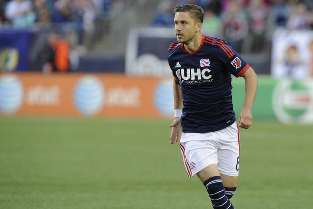May 16, 2015; Foxborough, MA, USA; New England Revolution defender Chris Tierney (8) controls the ball during the first half against the Toronto FC at Gillette Stadium. Mandatory Credit: Bob DeChiara-USA TODAY Sports