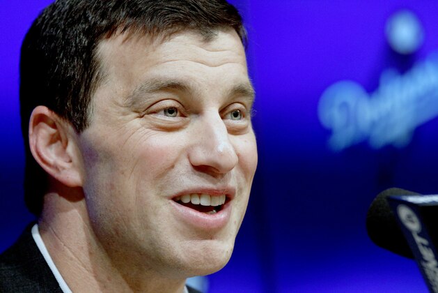 Andrew Friedman, a 37-year-old former Wall Street analyst, speaks after being introduced as the new Los Angeles Dodger president of baseball operations at Dodger Stadium in Los Angeles, Friday, Oct. 17, 2014. (AP Photo/Nick Ut)