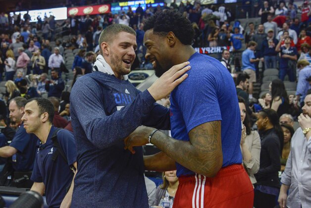 Dallas Mavericks forward Chandler Parsons (25) and Los Angeles Clippers center DeAndre Jordan (6) share a laugh following their NBA basketball game Friday, March 13, 2015, in Dallas.   Dallas won the game 129-99.  (AP Photo/Tim Sharp)