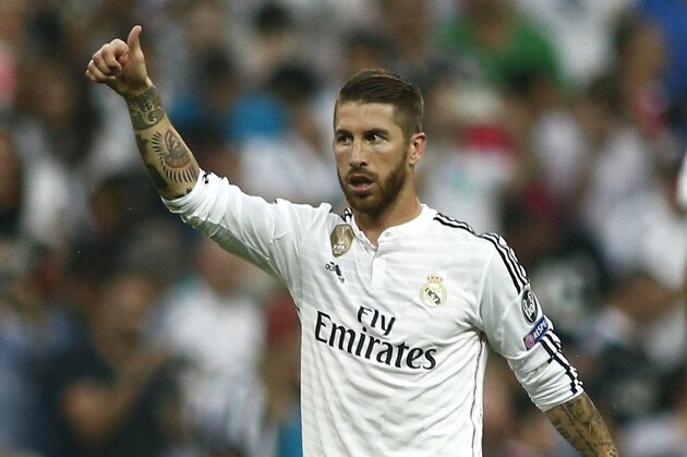 Real Madrid's Sergio Ramos reacts during the Champions League second leg semifinal soccer match between Real Madrid and Juventus, at the Santiago Bernabeu stadium in Madrid, Wednesday, May 13, 2015.  (AP Photo/Oscar del Pozo)
