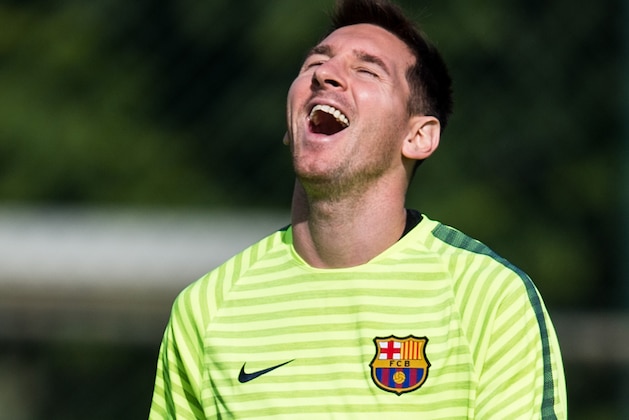 BARCELONA, SPAIN - OCTOBER 20:  Lionel Messi of FC Barcelona smiles during a training session ahead of their UEFA Champions League Group F match against AFC Ajax at Ciutat Esportiva on October 20, 2014 in Barcelona, Spain.  (Photo by David Ramos/Getty Images)