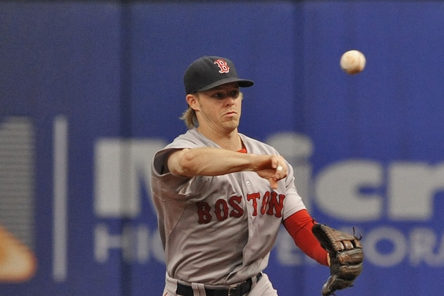 Boston Red Sox infielder Brock Holt fields a grounder during a baseball game against the Tampa Bay Rays Sunday, June 28, 2015, in St. Petersburg, Fla. (AP Photo/Steve Nesius)