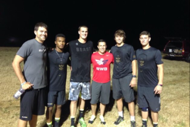 Former Elite 11 quarterback Paul Troth [far left] has found success in the real world after his playing career ended.