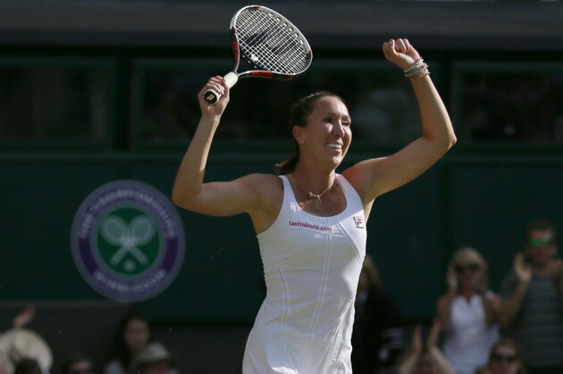 Jelena Jankovic of Serbia celebrates defeating Petra Kvitova of the Czech Republic in their singles match at the All England Lawn Tennis Championships in Wimbledon, London, Saturday July 4, 2015. Jankovic won the match 3-6, 7-5, 6-4. (AP Photo/Tim Ireland)