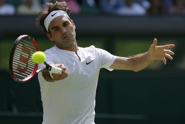 Roger Federer of Switzerland returns a shot to Sam Groth of Australia during their singles match at the All England Lawn Tennis Championships in Wimbledon, London, Saturday July 4, 2015. (AP Photo/Tim Ireland) Roger Federer of Switzerland returns a shot to Sam Groth of Australia during their singles match at the All England Lawn Tennis Championships in Wimbledon, London, Saturday July 4, 2015. (AP Photo/Tim Ireland)