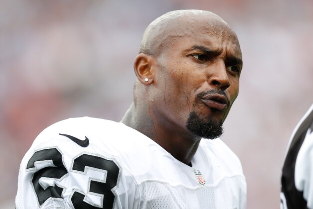 Sep 21, 2014; Foxborough, MA, USA; Oakland Raiders cornerback Tarell Brown (23) during the second quarter against the New England Patriots at Gillette Stadium. Mandatory Credit: Greg M. Cooper-USA TODAY Sports