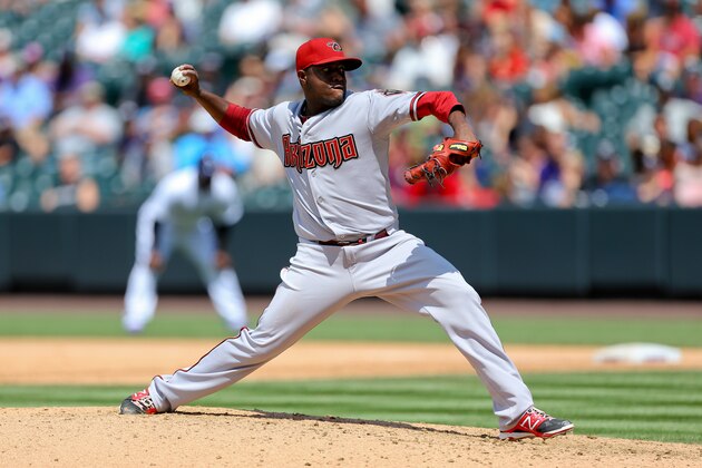 DENVER, CO - JUNE 25:  Starting pitcher Rubby De La Rosa #12 of the Arizona Diamondbacks delivers to home plate during the sixth inning against the Colorado Rockies at Coors Field on June 25, 2015 in Denver, Colorado. The Rockies defeated the Diamondbacks 6-4. (Photo by Justin Edmonds/Getty Images)