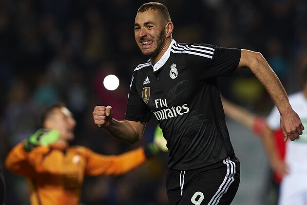 ELCHE, SPAIN - FEBRUARY 22: Karim Benzema of Real Madrid celebrates after scoring during the La Liga match between Elche FC and Real Madrid at Estadio Manuel Martinez Valero on February 22, 2015 in Elche, Spain. (Photo by Manuel Queimadelos Alonso/Getty Images) ELCHE, SPAIN - FEBRUARY 22: Karim Benzema of Real Madrid celebrates after scoring during the La Liga match between Elche FC and Real Madrid at Estadio Manuel Martinez Valero on February 22, 2015 in Elche, Spain. (Photo by Manuel Queimadelos Alonso/Getty Images)