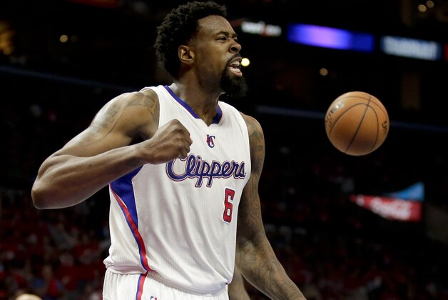 Los Angeles Clippers center DeAndre Jordan celebrates against the San Antonio Spurs during the first half of Game 1 of a first-round NBA basketball  playoff series in Los Angeles, Sunday, April 19, 2015. (AP Photo/Chris Carlson)