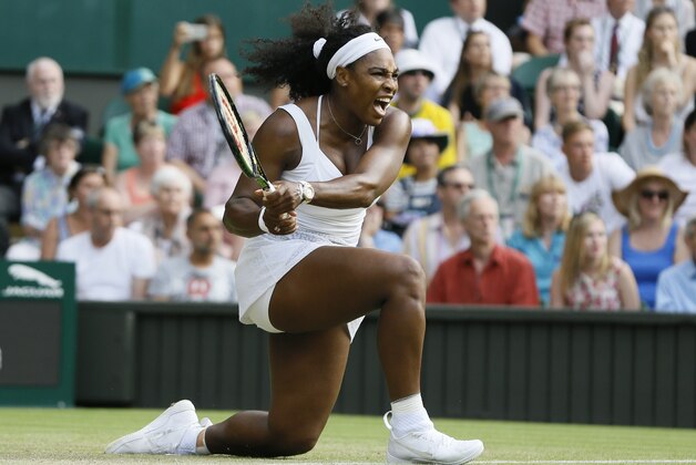 Serena Williams of the United States  celebrates winning a point against Heather Watson of Britain, during their singles match, at the All England Lawn Tennis Championships in Wimbledon, London, Friday July 3, 2015. (AP Photo/Kirsty Wigglesworth)