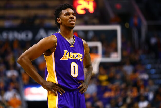 Jan 19, 2015; Phoenix, AZ, USA; Los Angeles Lakers forward Nick Young (0) against the Phoenix Suns at US Airways Center. The Suns defeated the Lakers 115-100. Mandatory Credit: Mark J. Rebilas-USA TODAY Sports