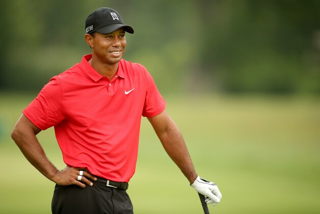 WHITE SULPHUR SPRINGS, WV - JULY 05:  Tiger Woods waits on the eighth tee during the final round of the Greenbrier Classic held at The Old White TPC on July 5, 2015 in White Sulphur Springs, West Virginia.  (Photo by Darren Carroll/Getty Images)
