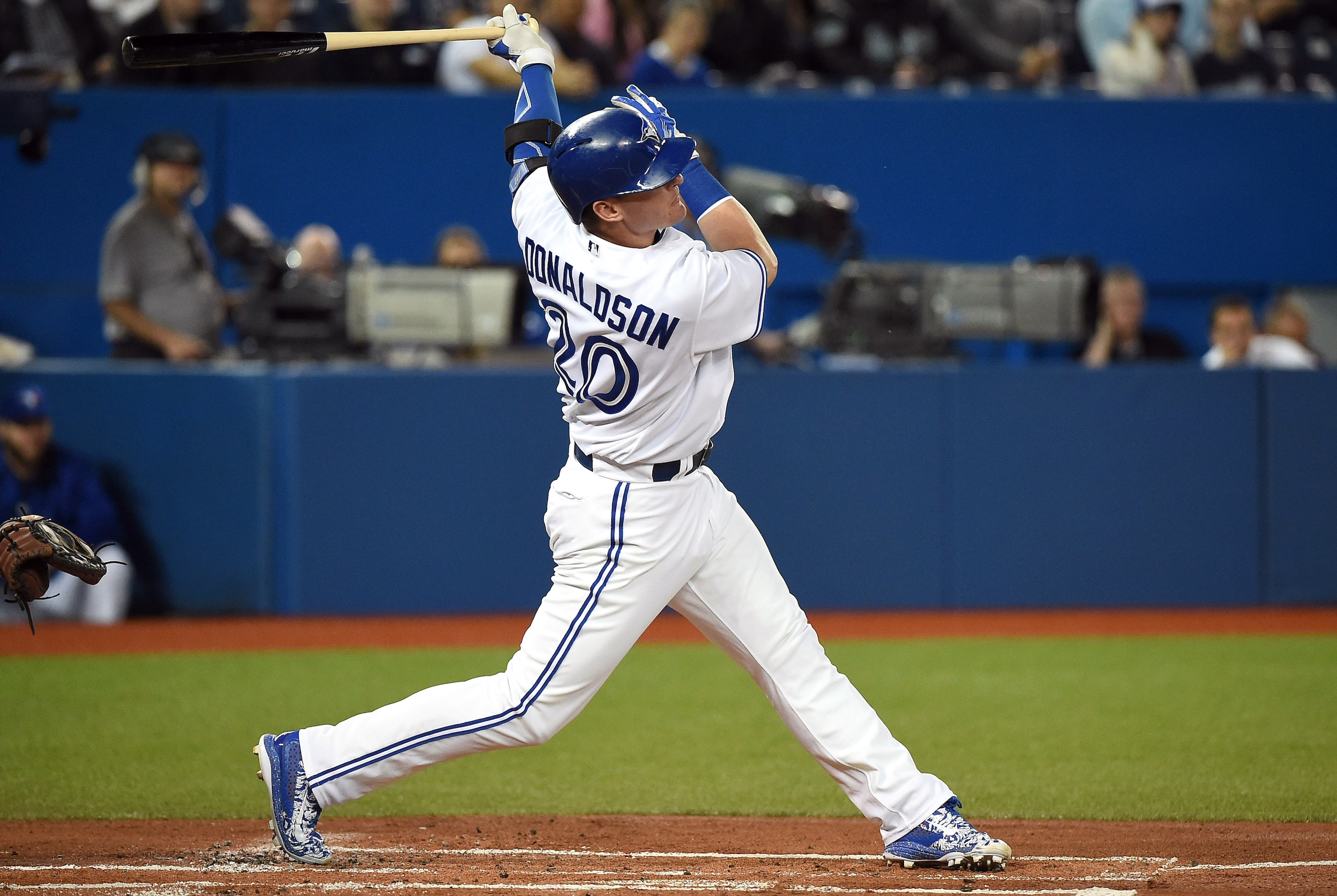 May 19, 2015; Toronto, Ontario, CAN; Toronto Blue Jays thirdbaseman Josh Donaldson (20) hits a home run against Los Angeles Angels in the first inning at Rogers Centre. Mandatory Credit: Dan Hamilton-USA TODAY Sports