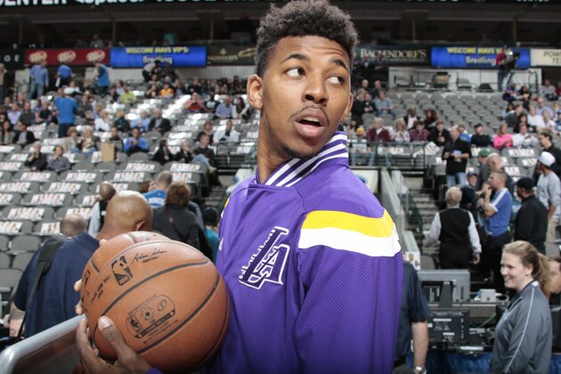 DALLAS, TX - DECEMBER 26: Nick Young #0 of the Los Angeles Lakers during warm ups before a game against the Dallas Mavericks on December 26, 2014 at the American Airlines Center in Dallas, Texas. NOTE TO USER: User expressly acknowledges and agrees that, by downloading and or using this photograph, User is consenting to the terms and conditions of the Getty Images License Agreement. Mandatory Copyright Notice: Copyright 2014 NBAE (Photo by Glenn James/NBAE via Getty Images)