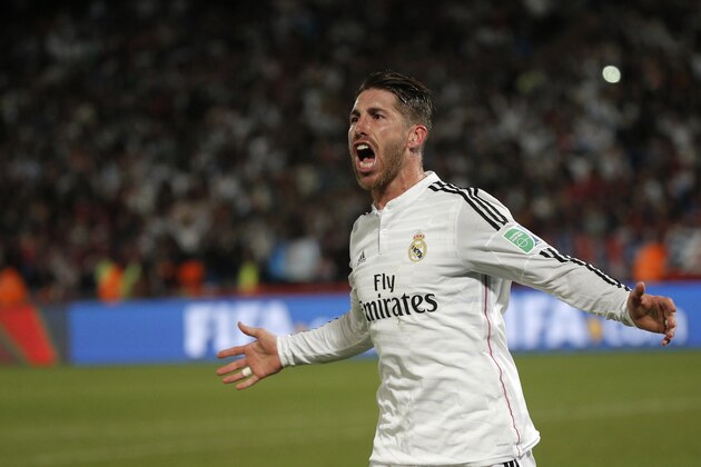 Real Madrid’s Sergio Ramos celebrates scoring the opening goal during the final soccer match between Real Madrid and San Lorenzo at the Club World Cup soccer tournament in Marrakech, Morocco, Saturday, Dec. 20, 2014. (AP Photo/Christophe Ena)