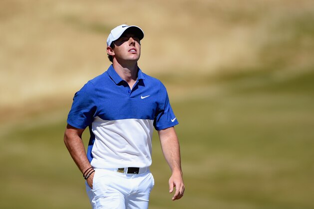 UNIVERSITY PLACE, WA - JUNE 21:  Rory McIlroy of Northern Ireland walks off the 14th hole during the final round of the 115th U.S. Open Championship at Chambers Bay on June 21, 2015 in University Place, Washington.  (Photo by Ross Kinnaird/Getty Images)