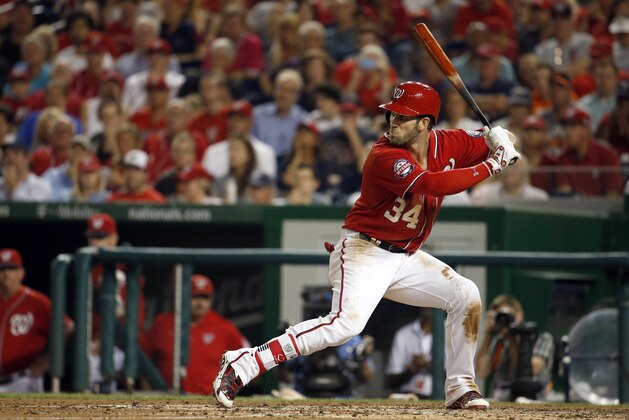 Washington Nationals right fielder Bryce Harper (34) bats during a baseball game against the San Francisco Giants at Nationals Park, Sunday, July 5, 2015, in Washington. (AP Photo/Alex Brandon)