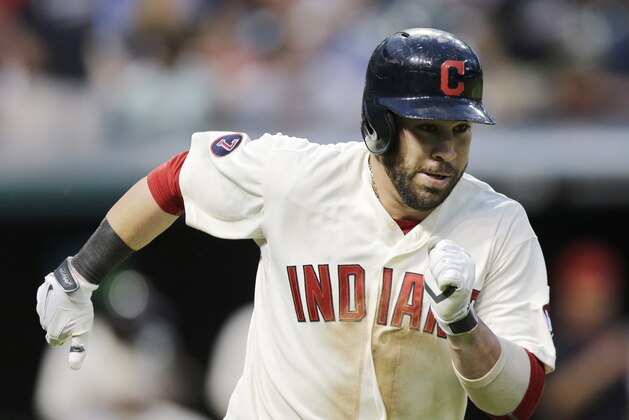 Cleveland Indians’ Jason Kipnis runs out a double off Tampa Bay Rays relief pitcher Ronald Belisario in the sixth inning of a baseball game, Saturday, June 20, 2015, in Cleveland. (AP Photo/Tony Dejak)