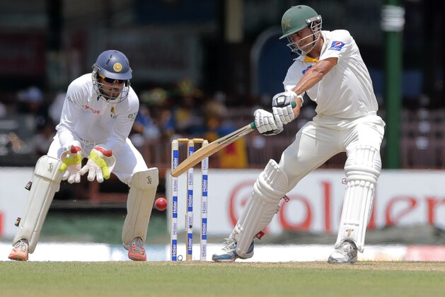 Pakistan's Younis Khan plays a shot as Sri Lanka's wicketkeeper Dinesh Chandimal watches during the first day of the second test cricket match between them in Colombo, Sri Lanka,Thursday, June 25, 2015. (AP Photo/Eranga Jayawardena) Pakistan's Younis Khan plays a shot as Sri Lanka's wicketkeeper Dinesh Chandimal watches during the first day of the second test cricket match between them in Colombo, Sri Lanka,Thursday, June 25, 2015. (AP Photo/Eranga Jayawardena)