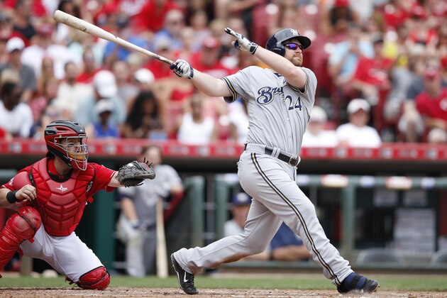 CINCINNATI, OH - JULY 5: Adam Lind #24 of the Milwaukee Brewers hits a two-run home run in the seventh inning against the Cincinnati Reds at Great American Ball Park on July 5, 2015 in Cincinnati, Ohio. The Brewers defeated the Reds 6-1. (Photo by Joe Robbins/Getty Images)