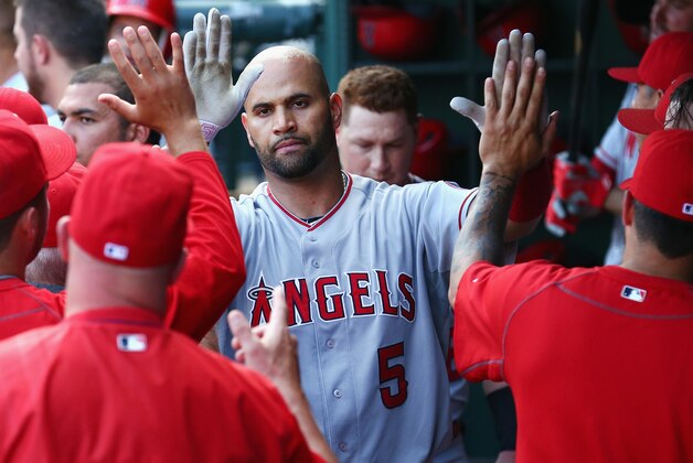 ARLINGTON, TX - JULY 05:  Albert Pujols #5 of the Los Angeles Angels celebrates after hitting a solo home run against the Texas Rangers in the top of the fourth inning at Globe Life Park in Arlington on July 5, 2015 in Arlington, Texas.  (Photo by Tom Pennington/Getty Images)