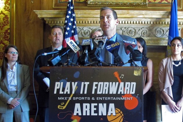 Steve Baas, lobbyist for the Metropolitan Milwaukee Association of Commerce, speaks in support of a $500 million financing deal for a new Milwaukee Bucks stadium on Monday, June 8, 2015, in Madison, Wis. The group of community business and labor leaders said the Legislature must act quickly to approve the financing deal to pay for a new arena or the agreement could fall apart, raising the prospect of more delays and the possible loss of the NBA team. (AP Photo/Scott Bauer)