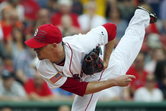 Boston Red Sox's Clay Buchholz pitches during the first inning of a baseball game against the Houston Astros in Boston, Saturday, July 4, 2015. (AP Photo/Michael Dwyer)