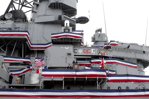 Los Angeles Mayor Antonio Villaraigosa, left stands by as Iowa Gov. Terry Branstad talks during the commissioning ceremony for the battleship USS Iowa as a memorial and an educational museum at the Port of Los Angeles in San Pedro, Calif. on Wednesday, July 4,2012. The ship, built in 1940, arrived in Los Angeles in May and will be permanently stationed in the port and operated as a floating museum. (AP Photo/Richard Vogel)
