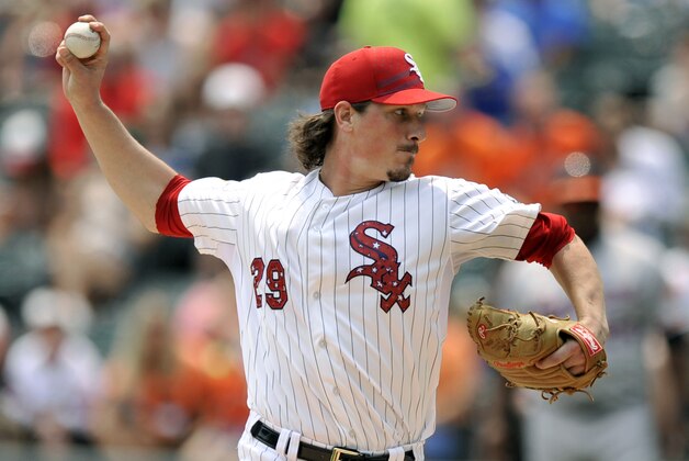 Chicago White Sox starter Jeff Samardzija delivers a pitch during the first inning of a baseball game against the Baltimore Orioles Saturday, July 4, 2015, in Chicago. (AP Photo/Paul Beaty)