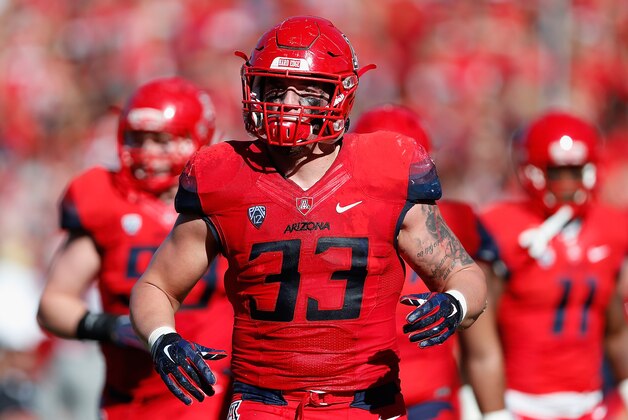 TUCSON, AZ - NOVEMBER 28:  Linebacker Scooby Wright III #33 of the Arizona Wildcats in action during the Territorial Cup college football game against the Arizona State Sun Devils in the third quarter at Arizona Stadium on November 28, 2014 in Tucson, Arizona.  (Photo by Christian Petersen/Getty Images)