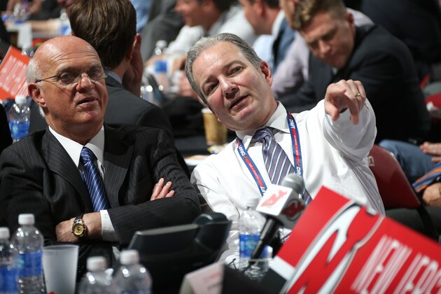 SUNRISE, FL - JUNE 26:  President Lou Lamoriello (L) and General Manager Ray Shero of the New Jersey Devils look on from the Devils draft table during Round One of the 2015 NHL Draft at BB&T Center on June 26, 2015 in Sunrise, Florida.  (Photo by Dave Sandford/NHLI via Getty Images)