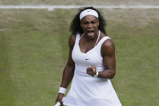 Serena Williams of the United States celebrates winning a point against Victoria Azarenka of Belarus during their singles match at the All England Lawn Tennis Championships in Wimbledon, London, Tuesday July 7, 2015. (AP Photo/Tim Ireland)