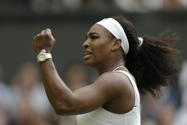Serena Williams of the United States celebrates winning a point against Victoria Azarenka of Belarus during their singles match at the All England Lawn Tennis Championships in Wimbledon, London, Tuesday July 7, 2015. (AP Photo/Pavel Golovkin)