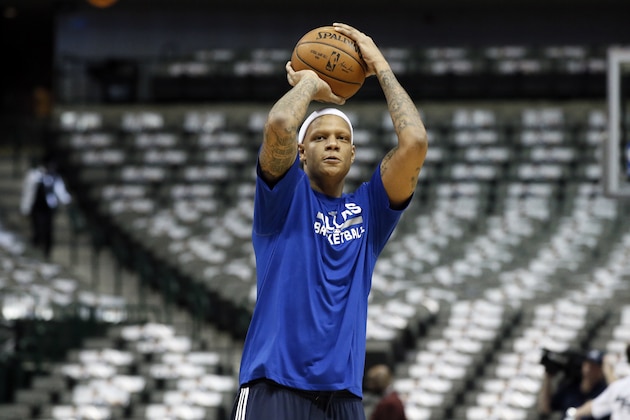 Dallas Mavericks forward Charlie Villanueva warms up before an NBA basketball game against the Minnesota Timberwolves, Monday, Feb. 2, 2015, in Dallas. (AP Photo/Tony Gutierrez)