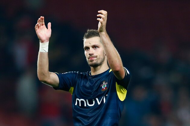 LONDON, ENGLAND - SEPTEMBER 23:  Morgan Schneiderlin of Southampton thanks the support at full time during the Capital One Cup Third Round match between Arsenal and Southampton at the Emirates Stadium on September 23, 2014 in London, England.  (Photo by Julian Finney/Getty Images)