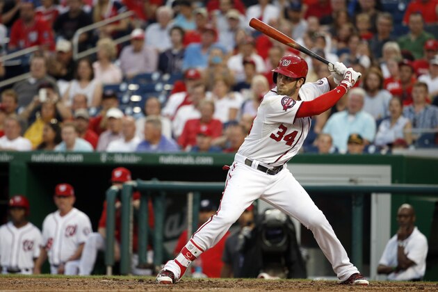 Washington Nationals right fielder Bryce Harper (34) bats during a baseball game against the Cincinnati Reds at Nationals Park, Monday, July 6, 2015, in Washington. (AP Photo/Alex Brandon)