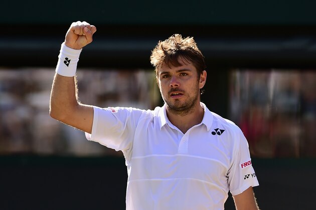 LONDON, ENGLAND - JULY 06: Stanislas Wawrinka of Switzerland celebrates match point in his Gentlemen's Singles Fourth Round match against David Goffin of Belgium during day seven of the Wimbledon Lawn Tennis Championships at the All England Lawn Tennis and Croquet Club on July 6, 2015 in London, England. (Photo by Shaun Botterill/Getty Images) LONDON, ENGLAND - JULY 06: Stanislas Wawrinka of Switzerland celebrates match point in his Gentlemen's Singles Fourth Round match against David Goffin of Belgium during day seven of the Wimbledon Lawn Tennis Championships at the All England Lawn Tennis and Croquet Club on July 6, 2015 in London, England. (Photo by Shaun Botterill/Getty Images)